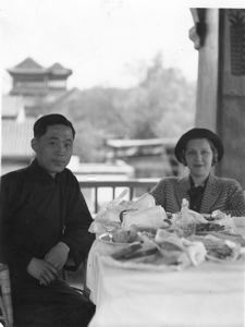 Image: Miriam Macmillan at lunch table on balcony, with Asian guide