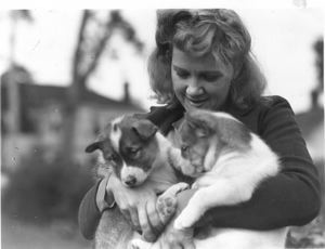 Image: Laura Look holding two pups