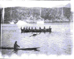 Image of Oomiak [umiak] and kayaks