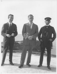 Image of Robert E. Peary and an officer standing on bluff (or library roof?)