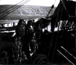 Image of 8 Inuit men and women aboard