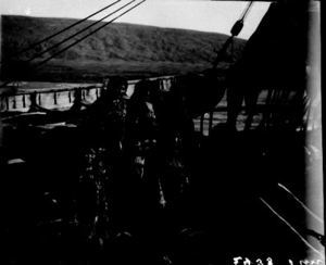 Image of 8 Inuit men and women aboard