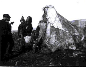 Image of Inuit couple, child, and 2 crewmen by tupik