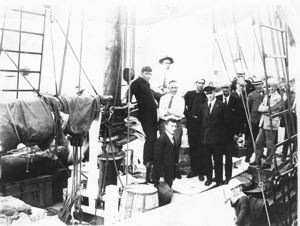 Image of Crew and guests aboard the Bowdoin. Included: Thomas McCue. Jot Small, Ralph Rob