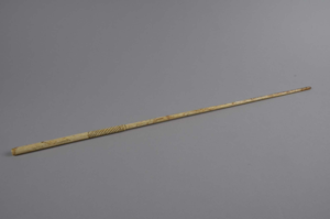 Image of whalebone rod, drilled at one end