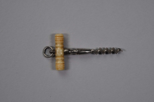 Image of miniature corkscrew with carved ivory handle