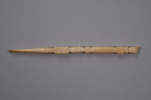 Image: ivory crochet hook with carved hand, pointing