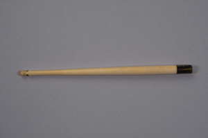Image of carved ivory handle with brass ferrule
