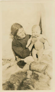 Image of Ane with baby Ole Petersen