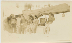 Image of Ane Petersen, three Inuit women and two men by Brunswick record player aboard th