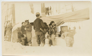 Image of Crew and Inuit women dancing aboard the Bowdoin . Includes Ane Petersen, Thomas