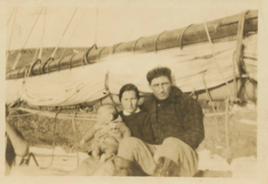 Image of Ane and Ole Petersen with Thomas McCue, aboard