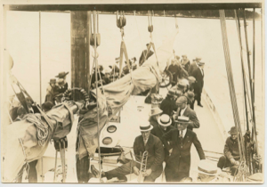 Image of Visitors and musicians aboard the Bowdoin