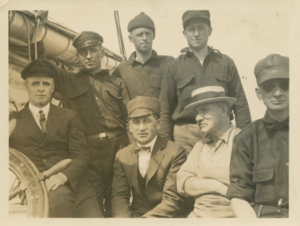 Image of Crew: rear: Thomas McCue, Donald Mix, Sheldon Fairbanks. Front: Donald MacMill