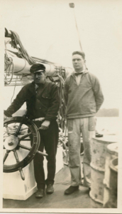 Image of Thomas McCue and Richard Goddard by wheel