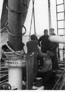 Image of Hoisting the storm sail aboard the CLUETT