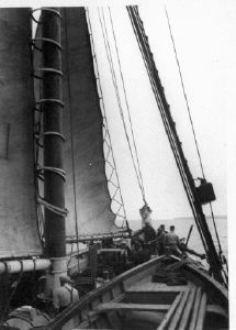Image of Hoisting the jumbo sail aboard the CLUETT