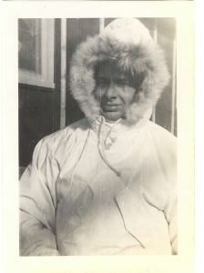 Image of Man in parka with fur trimmed hood