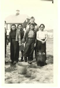 Image of Five Greenlandic women and serviceman by church