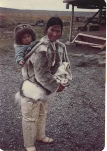 Image of Polar Inuit [Inughuit] mother with child in hood