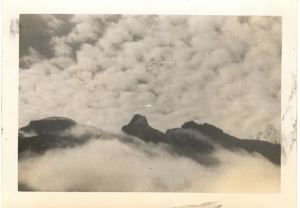Image of Clouds over mountains from air at Bluie West 1