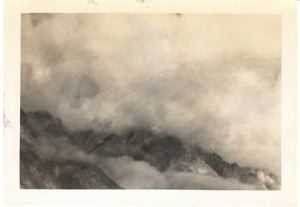 Image of Clouds over mountains from air