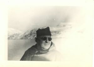 Image of Officer wearing sun glasses, on ship