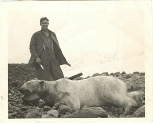 Image of Sgt. Davis Cook with dead polar bear