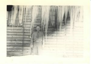 Image of Serviceman by officers' barracks. Big icicles