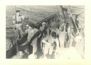 Image of Men on freighter's bow