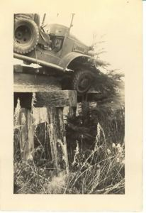 Image of Truck that slipped off road, showing bridge