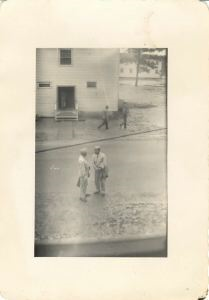Image of Servicemen in flooded street (one may be Rutledge)