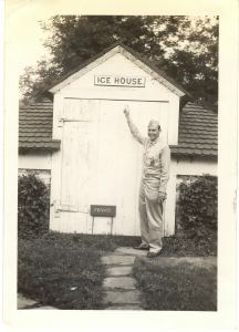 Image: Rutledge pointing to sign on building Ice House; another sign below Private