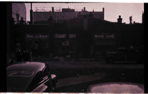Image of Detail of Cocoanut Grove after the fire, building, car, Dine & Dance sign