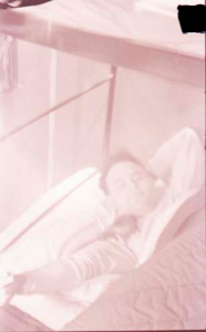 Image: Man sleeping in bunk bed
