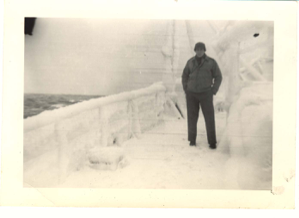 Image of Rutledge (Lt.) on ice-encrusted deck