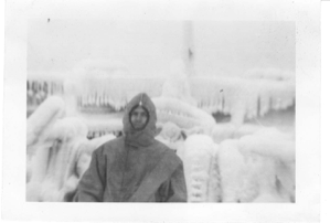 Image: Man on ice-encrusted deck
