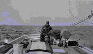 Image of Doc at the wheel. Sparks studying compass