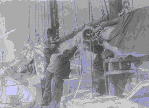 Image of Crewmen working with sails