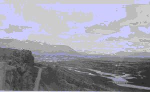 Image: Road in rift at Thingvellir, bridge and distant farm