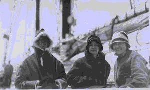 Image of Three women visitors aboard