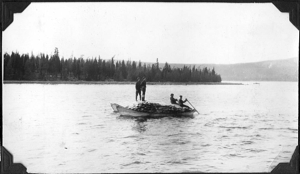 Image of Ferrying lumber ashore