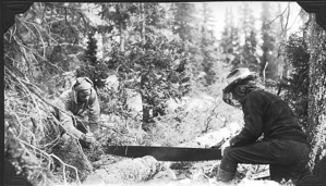 Image of Kennett Rawson and Arthur Ruecket clearing land