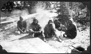 Image of Five Nascopie men sitting on ground