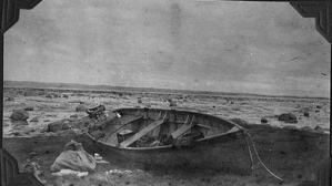 Image of Motor boat on beach at low tide - Jordan River