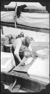 Image: The cook working on deck