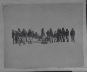 Image: Inuit men, women, children by sledge with odometer 
