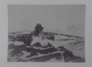 Image of Snow and rocks. Inuit beyond  