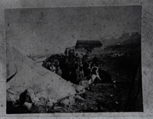 Image of Inuit women and children by tupik. Lodge in background  
