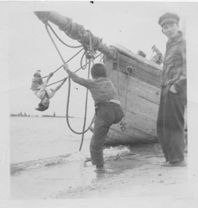 Image of Swinging on the hull at Northwest River